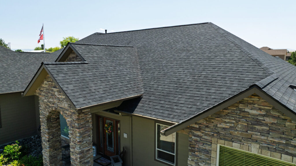 Frontal shot of a residential roofing project completed by Russell Quality Roofing