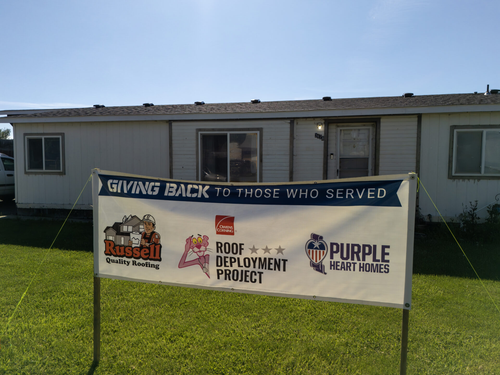 Russell Quality Roofing crew installing a new roof for Navy veteran Patrick Santos Jr. in Lewiston, Idaho, as part of the Owens Corning Roof Deployment Project